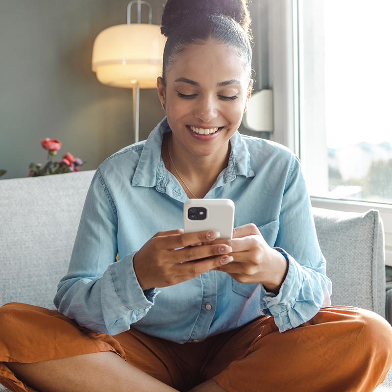 Woman checking insurance coverage with Citadel Insurance Group, Inc.